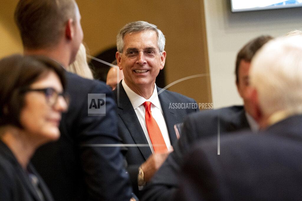 Ben Gray Incumbent Georgia Secretary of State Brad Raffensperger talks with supporters during an election night party Tuesday evening, May 24, 2022, at a small restaurant in Peachtree Corners, Ga. (AP Photo/Ben Gray)