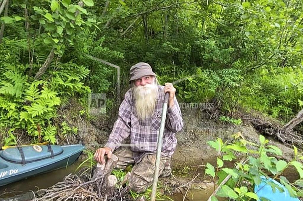 Jodie Gedeon In this undated photo provided by Jodie Gedeon, David Lidstone, 81, smiles in the woods of Canterbury, N.H. Lidstone has lived in the woods along the Merrimack River for nearly three decades in a shack, growing his own food and cutting his firewood. He's now jailed after not complying with a court order to leave, and there's a growing petition to just let "River Dave" live out his days off the grid. (Jodie Gedeon via AP)