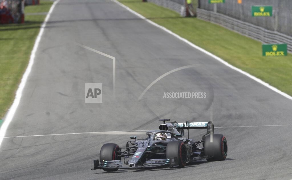Luca Bruno Mercedes driver Lewis Hamilton of Britain steers his car during the qualifying session at the Monza racetrack, in Monza, Italy, Saturday, Sept. 7, 2019. The Formula one race will be held on Sunday. (AP Photo/Luca Bruno)