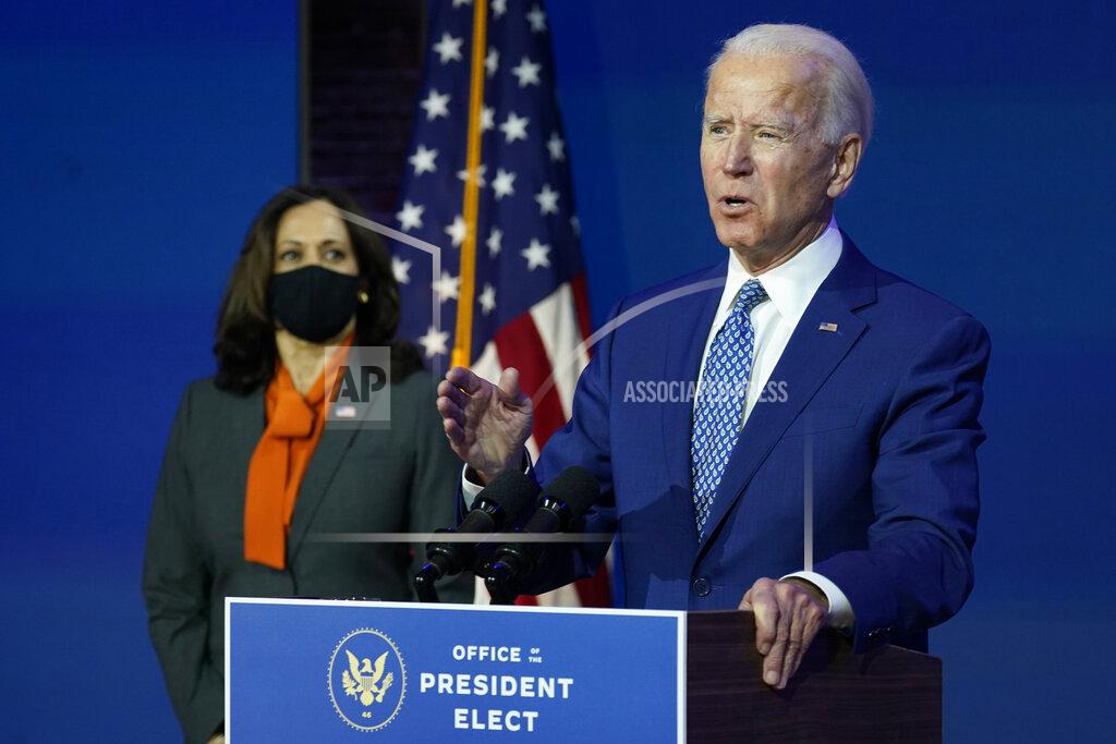 Carolyn Kaster President-elect Joe Biden, joined by Vice President-elect Kamala Harris, speaks at The Queen theater, Monday, Nov. 9, 2020, in Wilmington, Del. (AP Photo/Carolyn Kaster)