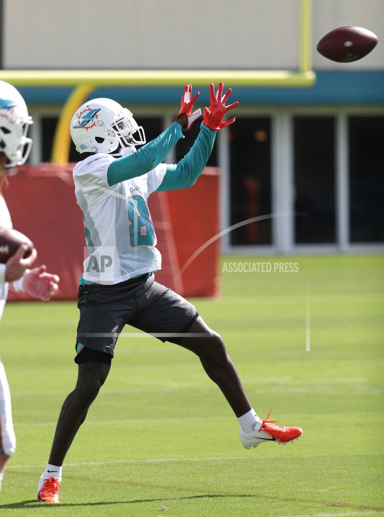 Lynne Sladky Miami Dolphins wide receiver Allen Hurns does drills during NFL football training camp, Friday, July 26, 2019, in Davie, Fla. Hurns, who suffered a leg injury with the Dallas Cowboys in January, signed a $3 million one-year contract Friday to play for his hometown team. (AP Photo/Lynne Sladky)