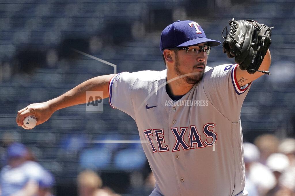 Charlie Riedel Texas Rangers starting pitcher Dane Dunning throws during the first inning of a baseball game against the Kansas City Royals Wednesday, June 29, 2022, in Kansas City, Mo. (AP Photo/Charlie Riedel)