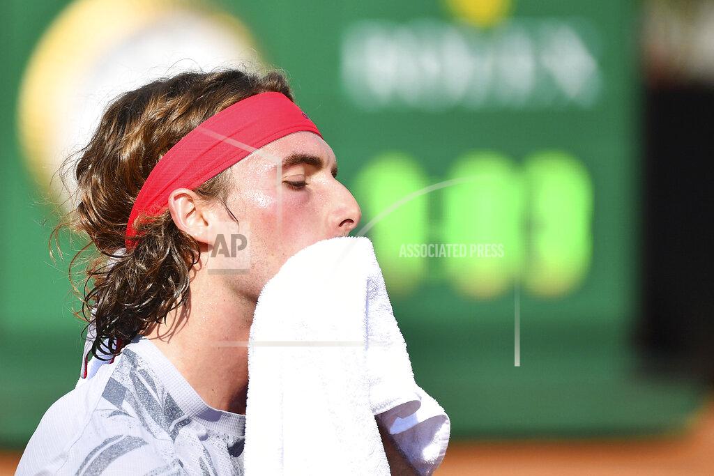Alfredo Falcone Greece's Stefanos Tsitsipas wipes his face during his match with Italy's Jannik Sinner, at the Italian Open tennis tournament in Rome, Wednesday, Sept. 16, 2020. (Alfredo Falcone/LaPresse via AP)