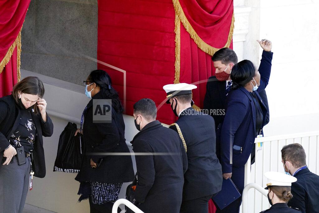 Carolyn Kaster People evacuate from the West Front of the U.S. Capitol during a rehearsal the 59th Presidential Inauguration at the U.S. Capitol in Washington, Monday, Jan. 18, 2021. (AP Photo/Carolyn Kaster)