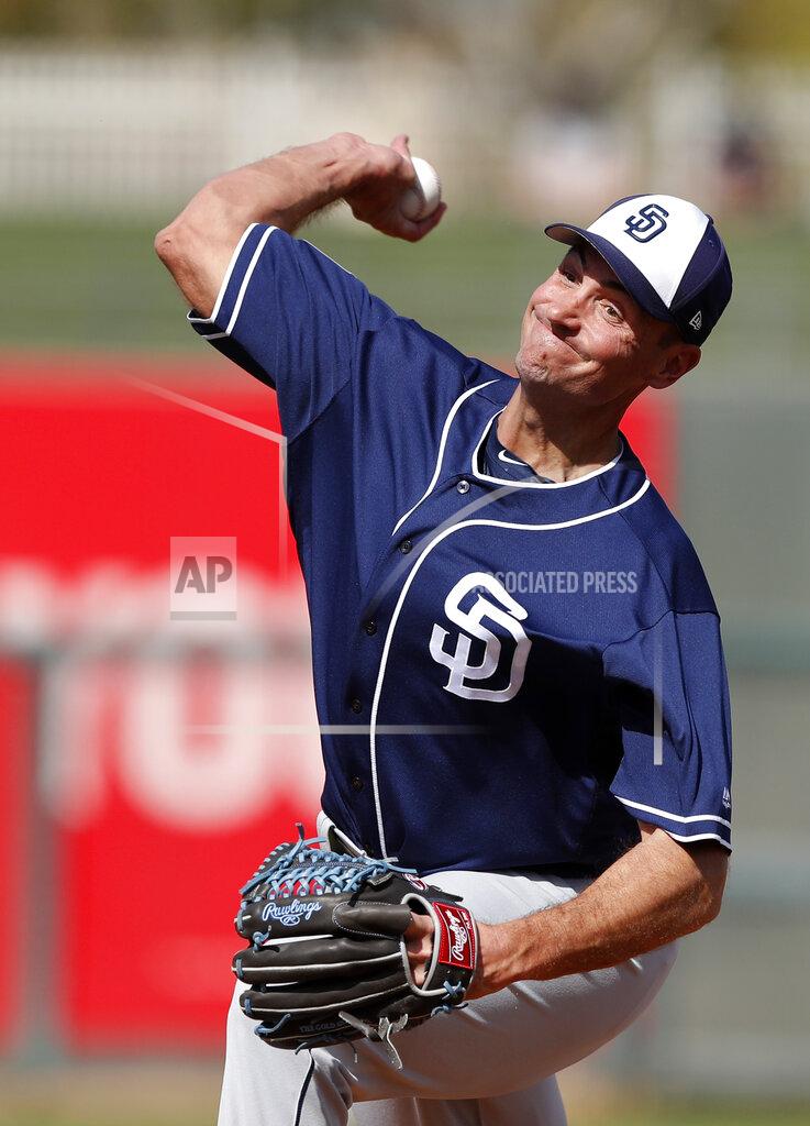 FILE - In this March 1, 2018, file photo, San Diego Padres pitcher Chris Young throws during the third inning of a spring training baseball game against the Texas Rangers in Surprise, Ariz. The Rangers hired Young as executive vice president and general manager Friday, Dec. 4, 2020, bringing the Major League Baseball executive home to work under president of baseball operations Jon Daniels, the club's GM since 2005. (AP Photo/Charlie Neibergall, File)