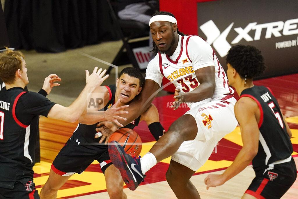 Charlie Neibergall Texas Tech guard Kevin McCullar fights for a rebound with Iowa State forward Solomon Young (33) during the first half of an NCAA college basketball game, Saturday, Jan. 9, 2021, in Ames, Iowa. (AP Photo/Charlie Neibergall)