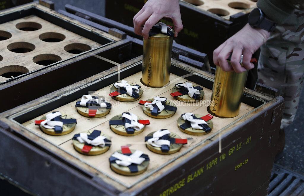 Alastair Grant A soldier prepares blank shells to be used during a 41 gun salute in memory of Prince Philip at the Royal Artillery barracks in Woolwich, London, Saturday, April 10, 2021. Buckingham Palace officials announced Friday that Prince Philip, the husband of Queen Elizabeth II, has died . He was 99. (AP Photo/Alastair Grant, Pool)