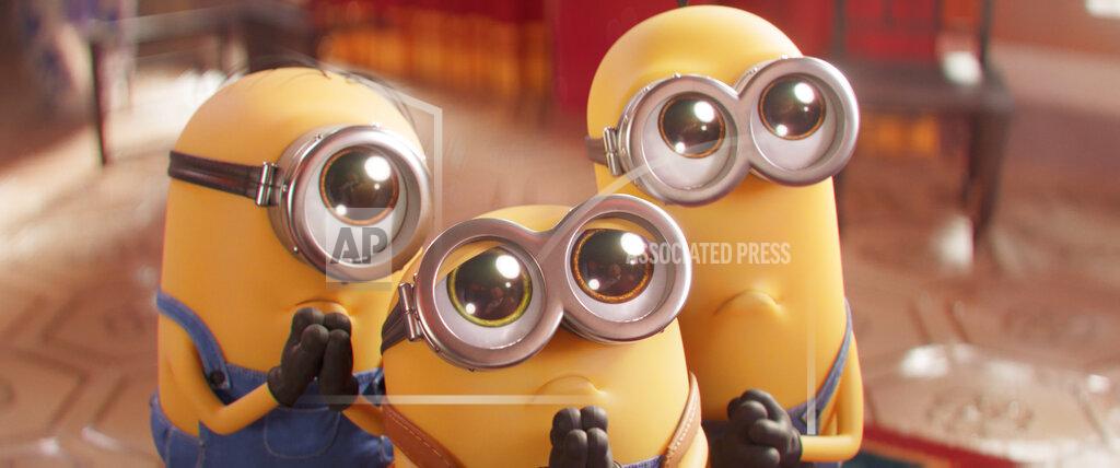 Illumination Entertainment This image released by Universal Pictures shows Minions characters, from left, Stuart, Bob and Kevin in a scene from "Minions: The Rise of Gru." (Illumination Entertainment/Universal Pictures via AP)