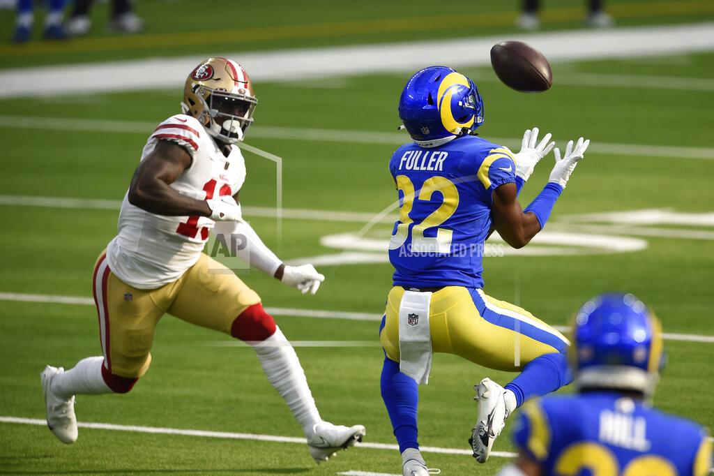 Kelvin Kuo Los Angeles Rams strong safety Jordan Fuller, right, intercepts a pass during the first half of an NFL football game against the San Francisco 49ers Sunday, Nov. 29, 2020, in Inglewood, Calif. (AP Photo/Kelvin Kuo)