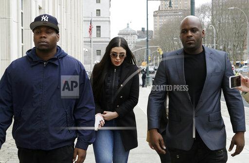 FILE - Emma Coronel, wife of Joaquin "El Chapo" Guzman, arrives at federal court in New York, Feb. 7, 2019. Prosecutors asked a judge on Thursday, Nov. 18, 2021, to impose a four-year prison sentence for Coronel, who will be sentenced at the end of the month for conspiring to distribute heroin, cocaine, marijuana and methamphetamine. (AP Photo/Mark Lennihan, File)