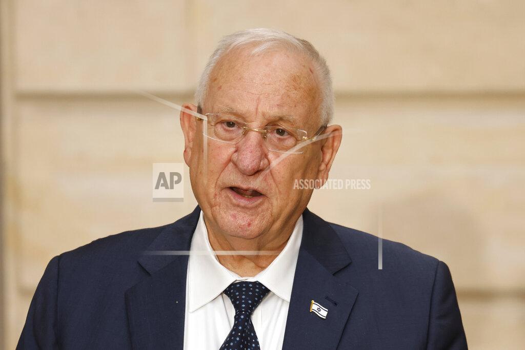 Ludovic Marin CORRECTS DATE TO WEDNESDAY, MARCH 31 - FILE - In this March 18, 2021 file photo, Israeli President Reuven Rivlin speaks during a joint press conference and a working lunch with French President Emmanuel Macron, at the Elysee Palace in Paris. Israeli election officials Wednesday, March 31, handed over the results of last week's vote to Rivlin, nudging forward the country's elusive efforts to break political deadlock, form a government and avoid an unprecedented fifth consecutive round of balloting. (Ludovic Marin, Pool via AP, File)