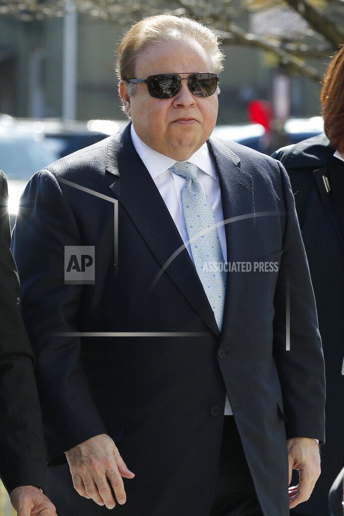 Julio Cortez FILE - In this April 2, 2015 file photo, Dr. Salomon Melgen arrives at the Martin Luther King Jr. Federal Courthouse for his arraignment in Newark, N.J. The prominent Florida eye doctor, convicted of defrauding Medicare out of $73 million, got out of prison early after former President Donald Trump commuted his sentence just hours before his term ended. (AP Photo/Julio Cortez, File)