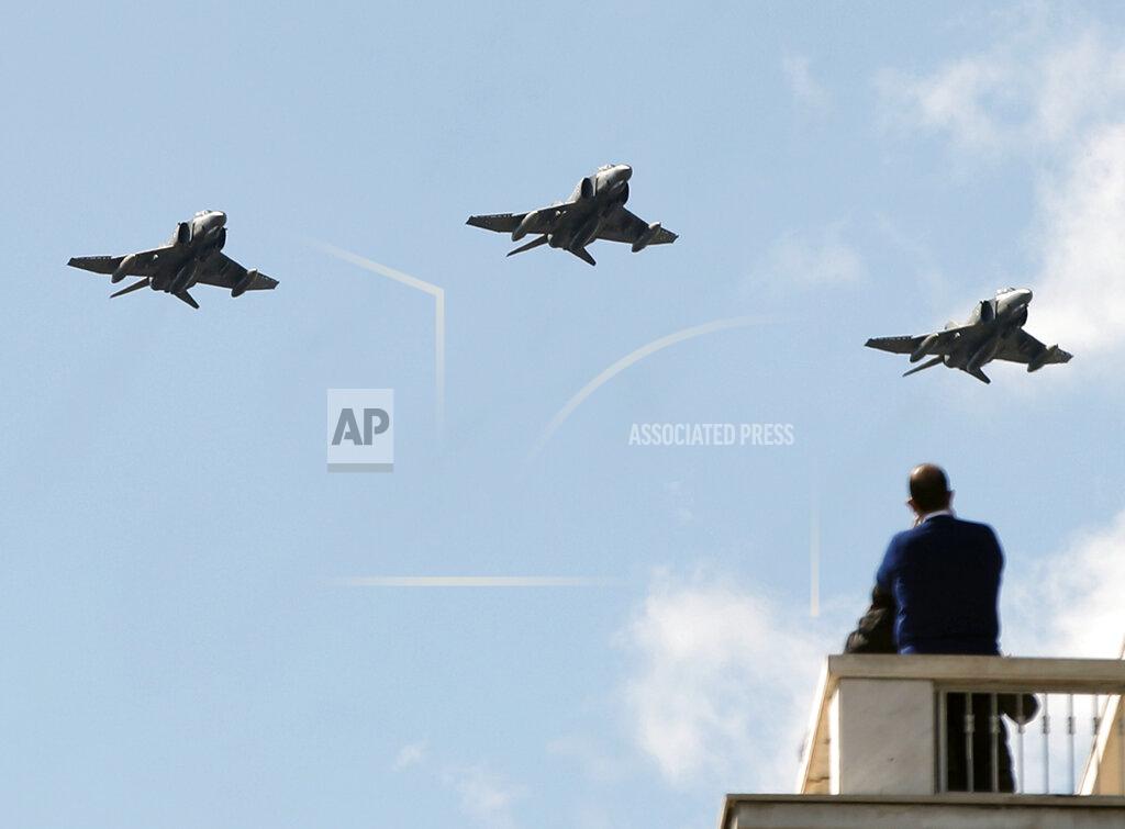 Thanassis Stavrakis Military fighter jets fly during a military parade in front of the Greek Parliament in Athens, Thursday, March 25, 2021. Greece celebrates the bicentenary of the start of the country's war of independence against the Ottoman Empire. (AP Photo/Thanassis Stavrakis)