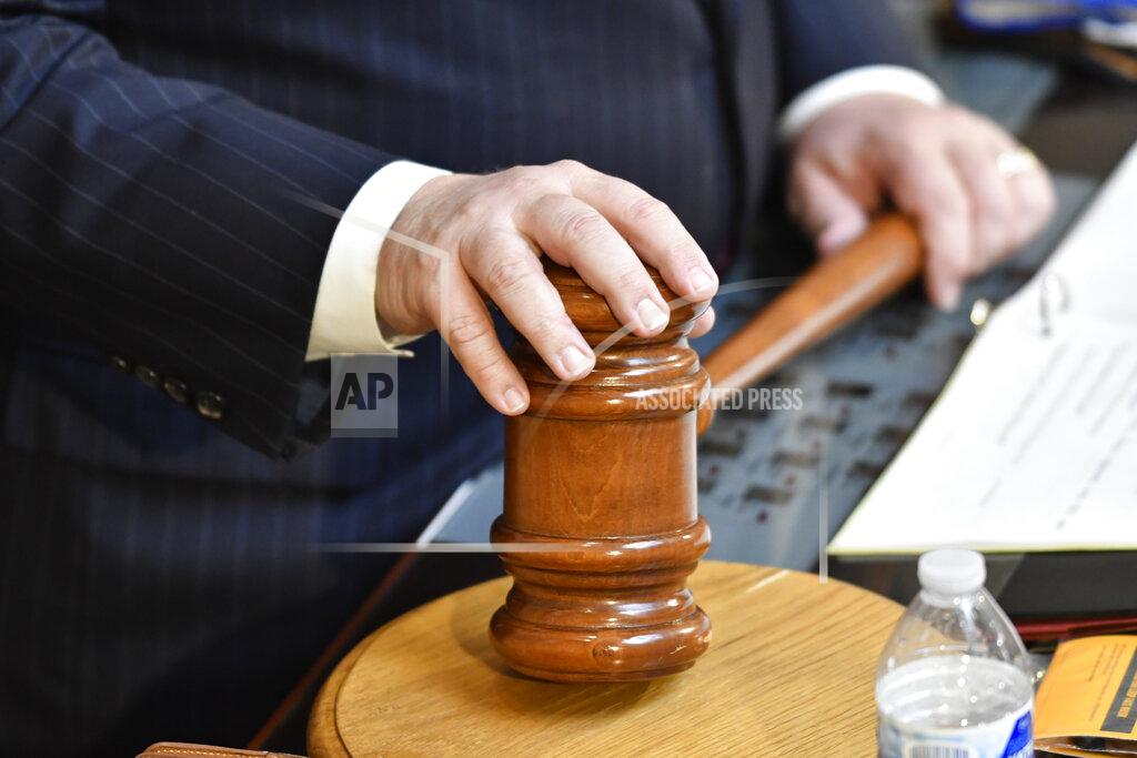Timothy D. Easley The hands of Kentucky Senate President David Stivers sit on his gavel during the final day of the session for the Kentucky Legislature at the Kentucky State Capitol in Frankfort, Ky., Tuesday, March 30, 2021. (AP Photo/Timothy D. Easley)