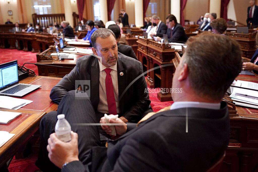Rich Pedroncelli Republican gubernatorial candidate state Sen. Brian Dahle, left, talks with fellow GOP state Sen. Andreas Borgeas at the Capitol in Sacramento, Calif., Thursday, June 9, 2022. Dahle finished second in California's primary on June 7, and knows it will be hard to defeat incumbent Democratic Gov. Gavin Newsom. He plans to focus on what he says are the problems people care about the most, including high gas prices and rising crime. (AP Photo/Rich Pedroncelli)
