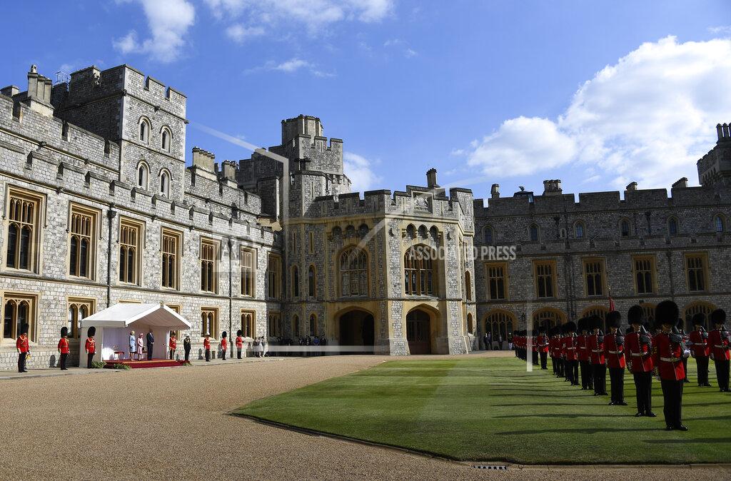 Alberto Pezzali Britain's Queen Elizabeth II stands with US President Joe Biden and First Lady Jill Biden as they review a Guard of Honour at Windsor Castle near London, Sunday, June 13, 2021. (AP Photo/Alberto Pezzali)
