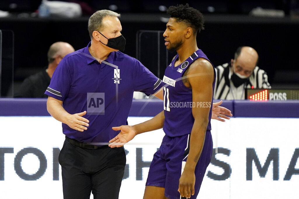 Nam Y. Huh Northwestern head coach Chris Collins, left, celebrates with guard Anthony Gaines during the second half of an NCAA college basketball game against Chicago State in Evanston, Ill., Saturday, Dec. 5, 2020. Northwestern won 111-66. (AP Photo/Nam Y. Huh)