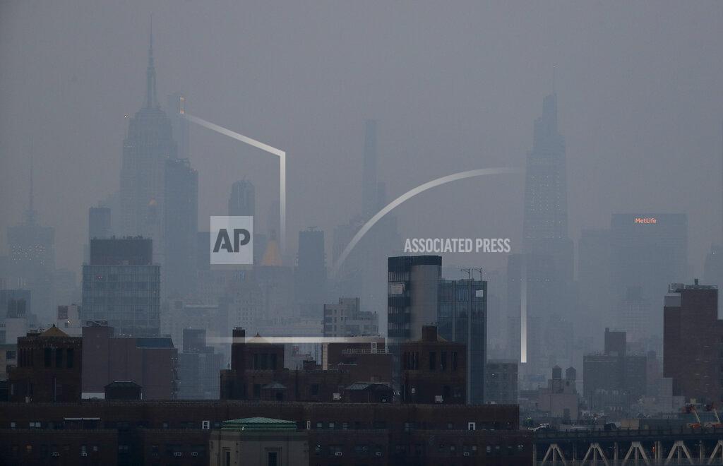 Julie Jacobson A thick haze hangs over Manhattan, Tuesday, July 20, 2021, in New York. Wildfires in the American West, including one burning in Oregon that's currently the largest in the U.S., are creating hazy skies as far away as New York as the massive infernos spew smoke and ash into the air in columns up to six miles high. (AP Photo/Julie Jacobson)