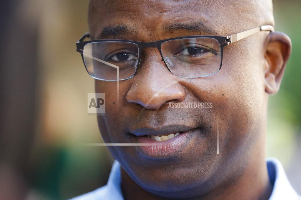 John Minchillo Jamaal Bowman speaks to reporters after voting at a polling station inside Yonkers Middle/High School, Tuesday, June 23, 2020, in Yonkers, N.Y. Bowman is running against veteran Rep. Eliot Engel in the Democratic primary for New York's 16th Congressional District. (AP Photo/John Minchillo)