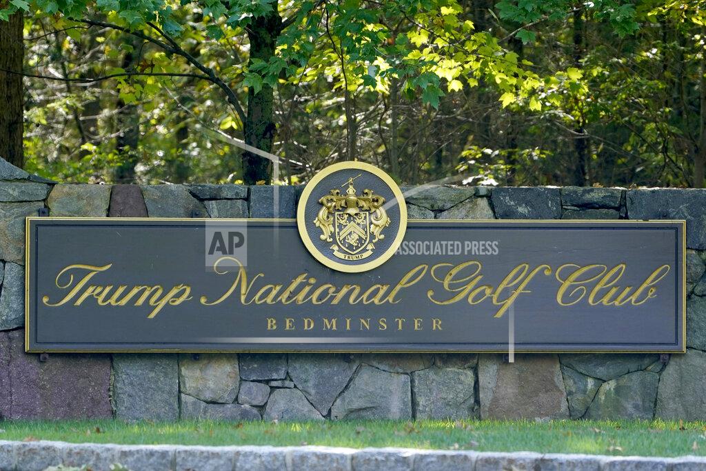 A sign is seen at the entrance to Trump National Golf Club in Bedminster, N.J., Friday, Oct. 2, 2020. With just a month to go until the election, President Donald Trump had a busy schedule in the week before the coronavirus hit home with him. Trump tweeted early Friday that he and first lady Melania Trump had tested positive for the coronavirus. (AP Photo/Seth Wenig)