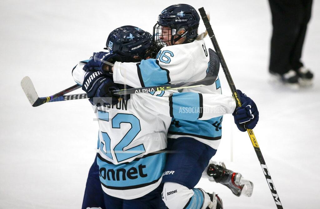 Jeff Mcintosh Team Sonnet Ella Shelton, left, celebrates his goal with teammate Loren Gabel during first period PWHPA Dream Tour hockey action against Team Bauer in Calgary, Monday, May 24, 2021.THE CANADIAN PRESS/Jeff McIntosh/The Canadian Press via AP)
