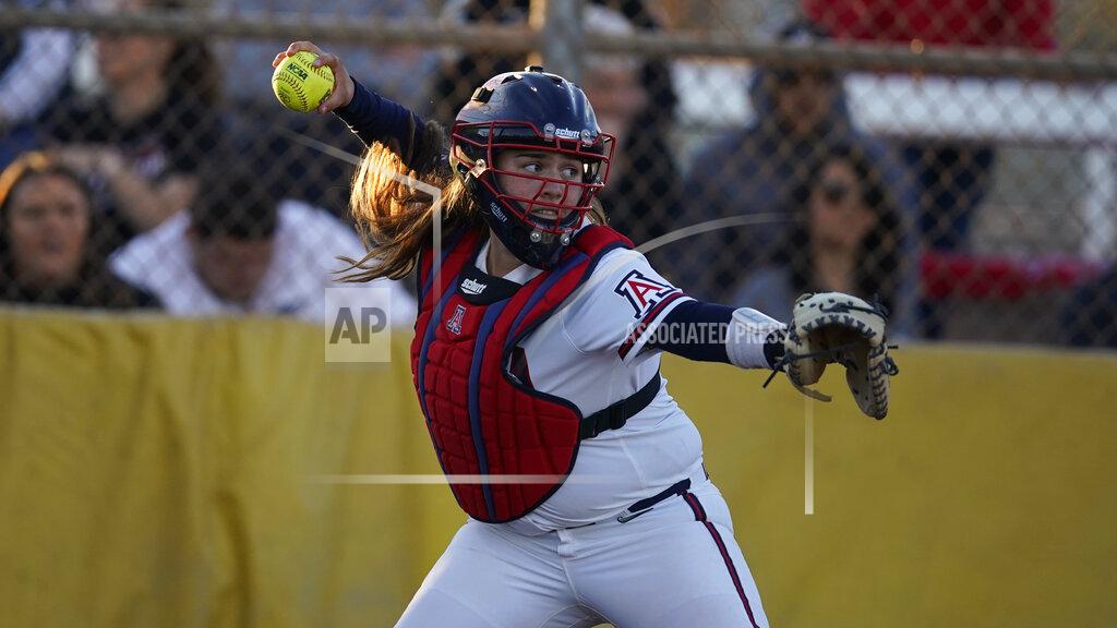 Rick Scuteri FILE - Arizona catcher Dejah Mulipola is shown during an NCAA college softball game against Seattle in Tempe, Ariz., in this Friday, Feb. 7, 2020, file photo. Division I softball is providing a training ground this season for players preparing for the 2021 Olympics. Mulipola is among 18 members of Team USA fighting for 15 spots on the squad that will go to Tokyo.(AP Photo/Rick Scuteri, File)