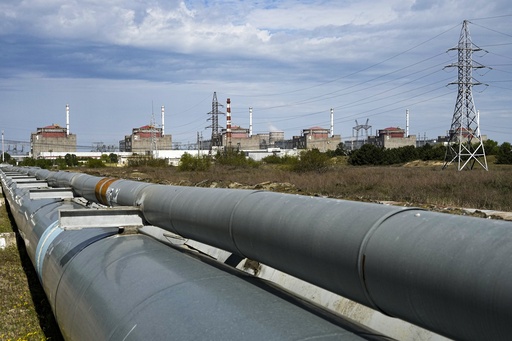 FILE - A view of the Zaporizhzhia Nuclear Power Station, in Enerhodar, Zaporizhzhia region, in territory under Russian military control, southeastern Ukraine, on May 1, 2022. Security at Ukraine's Zaporizhzhia Nuclear Power Plant remains fragile amid worrying recent staff cuts enacted by Russian authorities occupying the facility, which is one of the 10 biggest atomic power plants in the world, the United Nations nuclear watchdog chief said Tuesday, Feb. 6, 2024. (AP Photo/File)