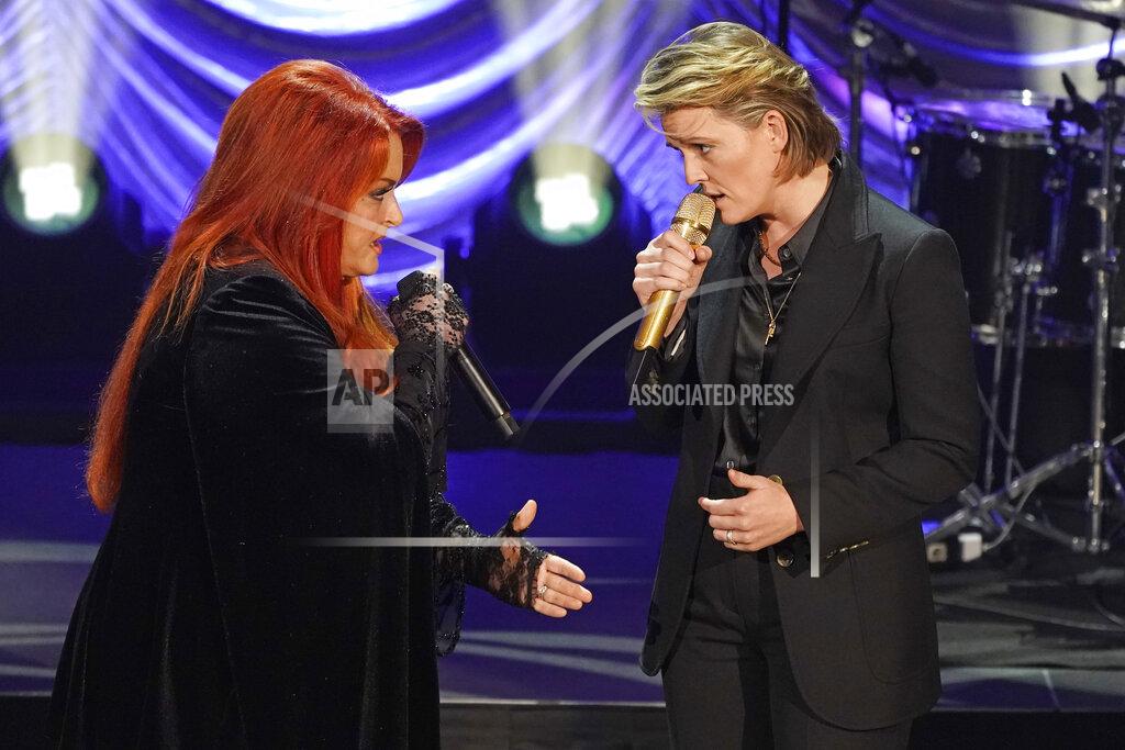 Mark Humphrey Wynonna Judd, left, and Brandi Carlile sing "The Rose" during a tribute to country music star Naomi Judd Sunday, May 15, 2022, in Nashville, Tenn. Naomi Judd died April 30. She was 76. (AP Photo/Mark Humphrey)