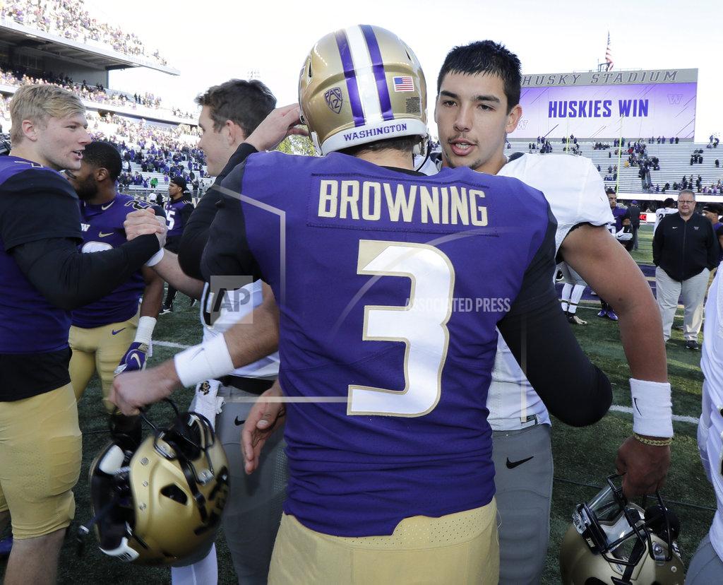 Ted S. Warren Washington quarterback Jake Browning (3) greets Colorado quarterback Steven Montez right, following an NCAA college football game, Saturday, Oct. 20, 2018, in Seattle. Washington won 27-13. (AP Photo/Ted S. Warren)
