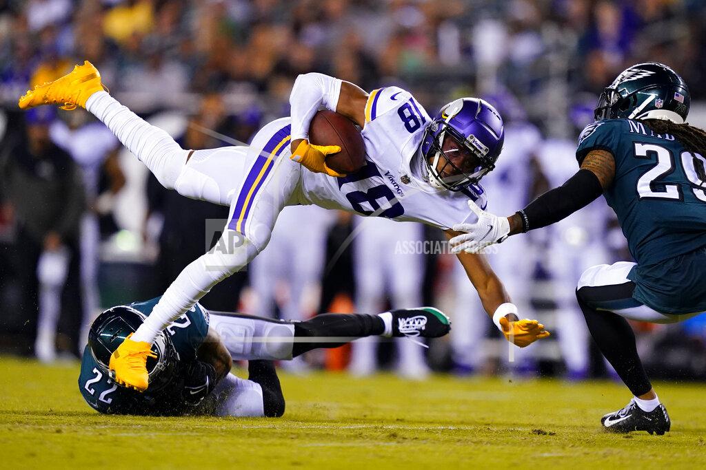 Matt Slocum Minnesota Vikings wide receiver Justin Jefferson (18) is tackled by Philadelphia Eagles safety Marcus Epps (22) and cornerback Avonte Maddox (29) after catching a pass during the second half of an NFL football game, Monday, Sept. 19, 2022, in Philadelphia. (AP Photo/Matt Slocum)