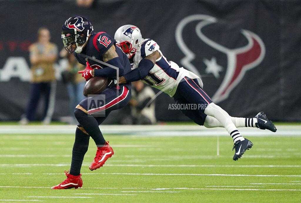 David J. Phillip New England Patriots cornerback Jonathan Jones (31) breaks up a pass intended for Houston Texans wide receiver Kenny Stills (12) during the second half of an NFL football game Sunday, Dec. 1, 2019, in Houston. (AP Photo/David J. Phillip)