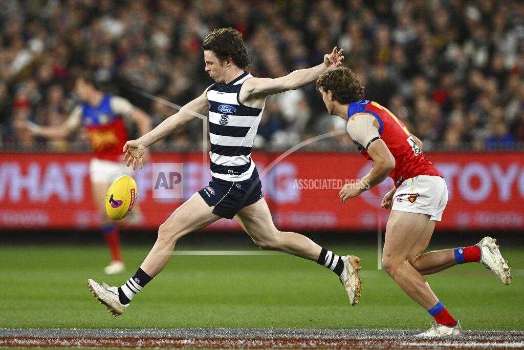 Joel Carrett Max Holmes of Geelong during the AFL Preliminary Final match between the Geelong Cats and the Brisbane Lions at the Melbourne Cricket Ground in Melbourne, Friday, Sept. 16, 2022. Early Saturday morning, at a half past midnight, a small but passionate group of fans will gather in front of their TVs in America. They'll be watching the Grand Final, the Super Bowl of Aussie rules football. (AAP Image/Joel Carrett)