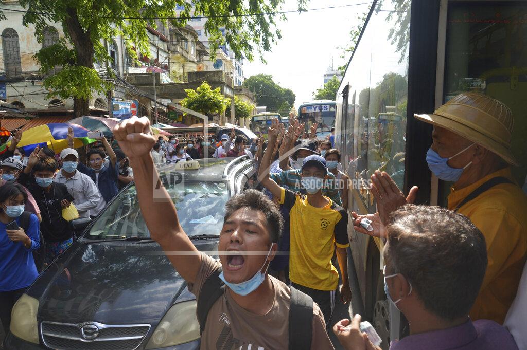 Uncredited Anti-coup protesters shout slogans during a demonstration on Thursday, May 6, 2021, in Yangon, Myanmar. More than 200 global organizations urged the U.N. Security Council on Wednesday, May 5, 2021, to impose an arms embargo on Myanmar, saying the time for statements has passed and immediate action is needed to help protect peaceful protesters against military rule and other opponents of the junta. (AP Photo)