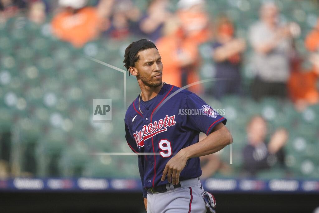 Carlos Osorio Minnesota Twins' Andrelton Simmons walks back to the dugout after striking out to end the tenth inning of a baseball game against the Detroit Tigers, Tuesday, April 6, 2021, in Detroit. (AP Photo/Carlos Osorio)