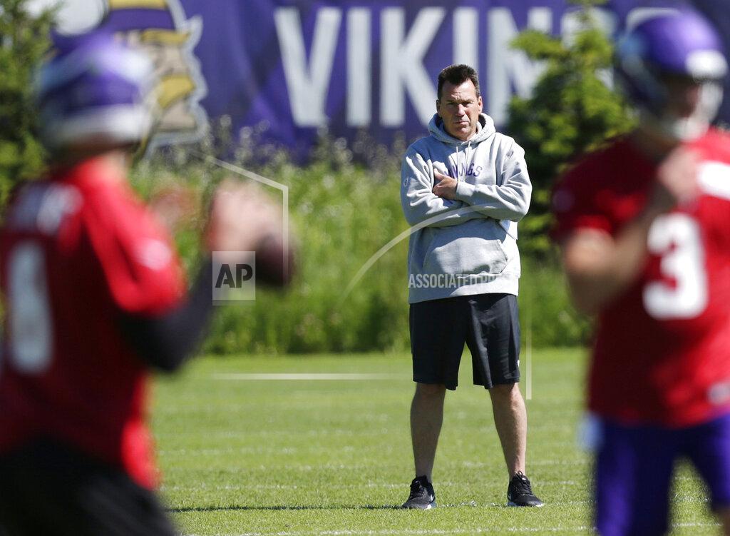 Andy Clayton-King Minnesota Vikings assistant head coach and offensive advisor Gary Kubiak watches quarterbacks during drills at the team's NFL football training facility in Eagan, Minn., Thursday, June 13, 2019. (AP Photo/Andy Clayton- King)