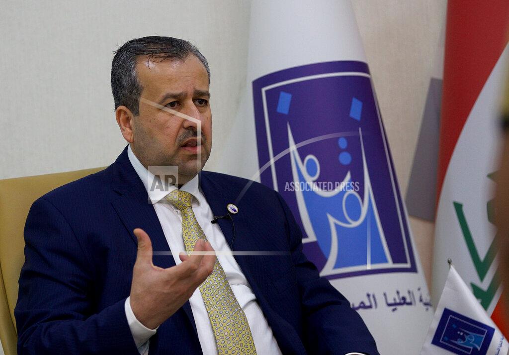 Hadi Mizban Judge Jaleel Adnan Khalaf, chairman of the Iraqi Independent High Electoral Commission, speaks during an interview with The Associated Press, Tuesday, Sept. 14, 2021, in Baghdad, Iraq. Iraq has identified and thwarted attempts of voter fraud less than one month before Iraq is set to hold federal polls including the selling of votes and intimidation using arms, the head of Iraq's electoral commission said. (AP Photo/Hadi Mizban)