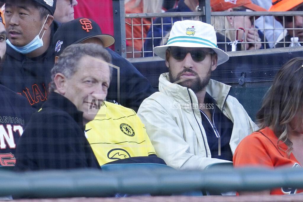 Jeff Chiu San Francisco Giants CEO Larry Baer, left, and Golden State Warriors basketball player Klay Thompson watch a baseball game between the Giants and the Los Angeles Dodgers in San Francisco, Sunday, Sept. 5, 2021. (AP Photo/Jeff Chiu)