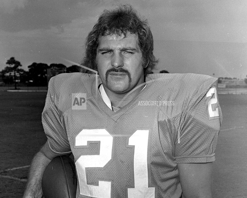 Uncredited FILE - In this Aug. 9, 1972, file photo, Miami Dolphins running back Jim Kiick poses for a photo. Former running back Kiick, who helped the Dolphins achieve the NFL’s only perfect season in 1972, has died at age 73. In recent years Kiick battled memory issues and lived in an assisted living home, and the team announced his death Saturday, June 20, 2020. (AP Photo/File)