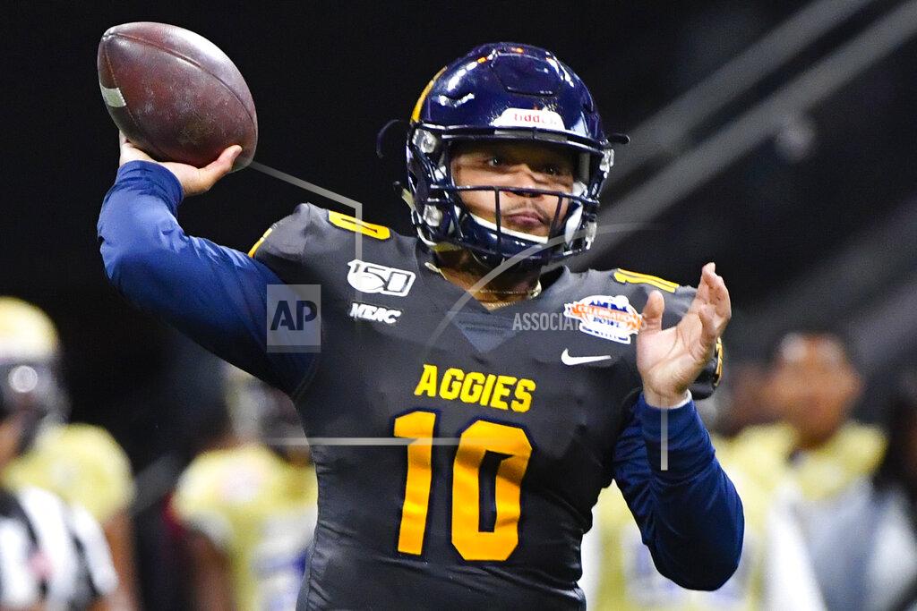 John Amis North Carolina A&T quarterback Kylil Carter (10) passes during first half of the Celebration Bowl NCAA college football game against Alcorn State, Saturday, Dec. 21, 2019, in Atlanta. (John Amis/Atlanta Journal-Constitution via AP)