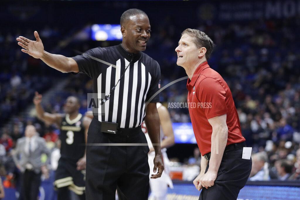 Mark Humphrey Arkansas head coach Eric Musselman reacts to a call in the first half of an NCAA college basketball game against Vanderbilt in the Southeastern Conference Tournament Wednesday, March 11, 2020, in Nashville, Tenn. (AP Photo/Mark Humphrey)