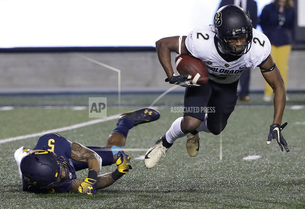 Jeff Chiu Colorado's Ronnie Blackmon, right, runs past California's Trey Turner III while returning a kick during the second half of an NCAA college football game in Berkeley, Calif., Saturday, Nov. 24, 2018. California won, 33-21. (AP Photo/Jeff Chiu)