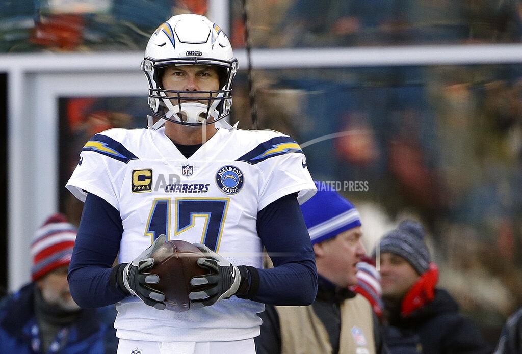 Steven Senne Los Angeles Chargers quarterback Philip Rivers warms up before an NFL divisional playoff football game against the New England Patriots, Sunday, Jan. 13, 2019, in Foxborough, Mass. (AP Photo/Steven Senne)