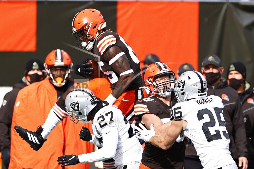 Ron Schwane Cleveland Browns tight end David Njoku (85) leaps after a pass reception during the first half of an NFL football game against the Las Vegas Raiders, Sunday, Nov. 1, 2020, in Cleveland. (AP Photo/Ron Schwane)