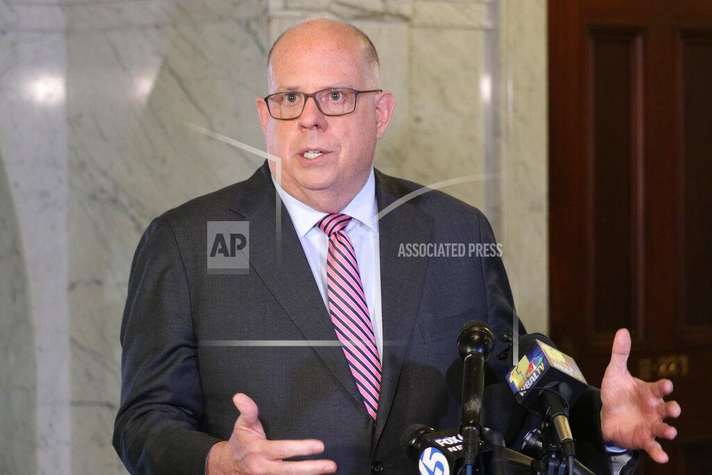 Brian Witte FILE - Maryland Gov. Larry Hogan talks to reporters, April, 4, 2022. Stunning new revelations about former President Donald Trump's fight to overturn the 2020 election have exposed growing political vulnerabilities just as he eyes another presidential bid. (AP Photo/Brian Witte, File)