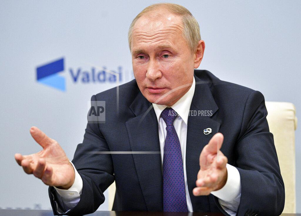 Alexei Druzhinin FILE - In this Oct. 22, 2020, file photo, Russian President Vladimir Putin speaks at the annual meeting of the Valdai Discussion Club via video conference at the Novo-Ogaryovo residence outside Moscow, Russia. Putin never calls Russian opposition leader Alexei Navalny by name, and state-run media depict him as an unimportant blogger. (Alexei Druzhinin, Sputnik, Kremlin Pool Photo via AP, File)