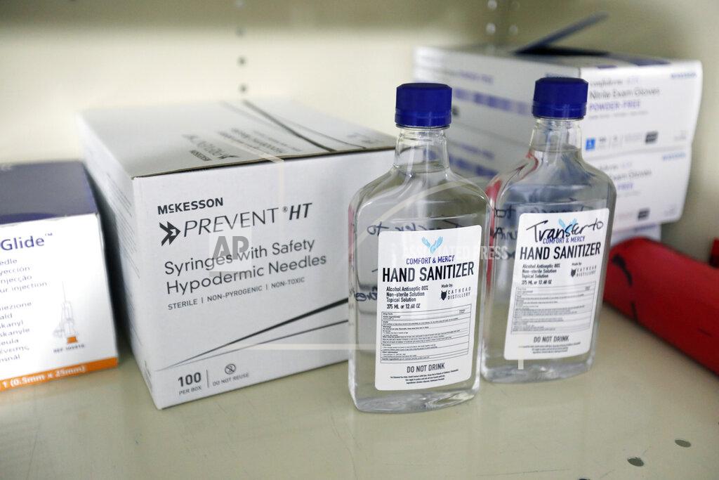 Rogelio V. Solis Medical supplies are laid out in the new mobile field clinic built in the basement of a parking garage on the campus of the University of Mississippi Medical Center in Jackson, Miss., Wednesday, April 8, 2020. Included in the supply cabinet are bottles of locally sourced hand sanitizer. The facility was built in anticipation of more coronavirus cases. The clinic will have a maximum capacity of around 24 patients, with each bay spaced out and separated from the others. (AP Photo/Rogelio V. Solis)