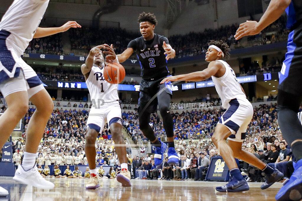 Keith Srakocic Pittsburgh's Xavier Johnson (1) and Duke's Cam Reddish (2) chase a loose ball during the first half of an NCAA college basketball game, Tuesday, Jan. 22, 2019, in Pittsburgh. (AP Photo/Keith Srakocic)