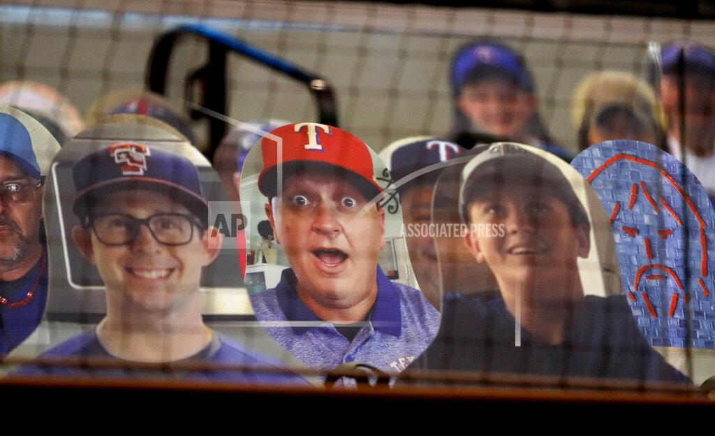 Lm Otero Cutout photos of people are set up in the stands at Globe Life Field in Arlington, Texas, Thursday, July 23, 2020, in preparation the Texas Rangers opening day baseball game. The Rangers host the Colorado Rockies on Friday. (AP Photo/LM Otero)