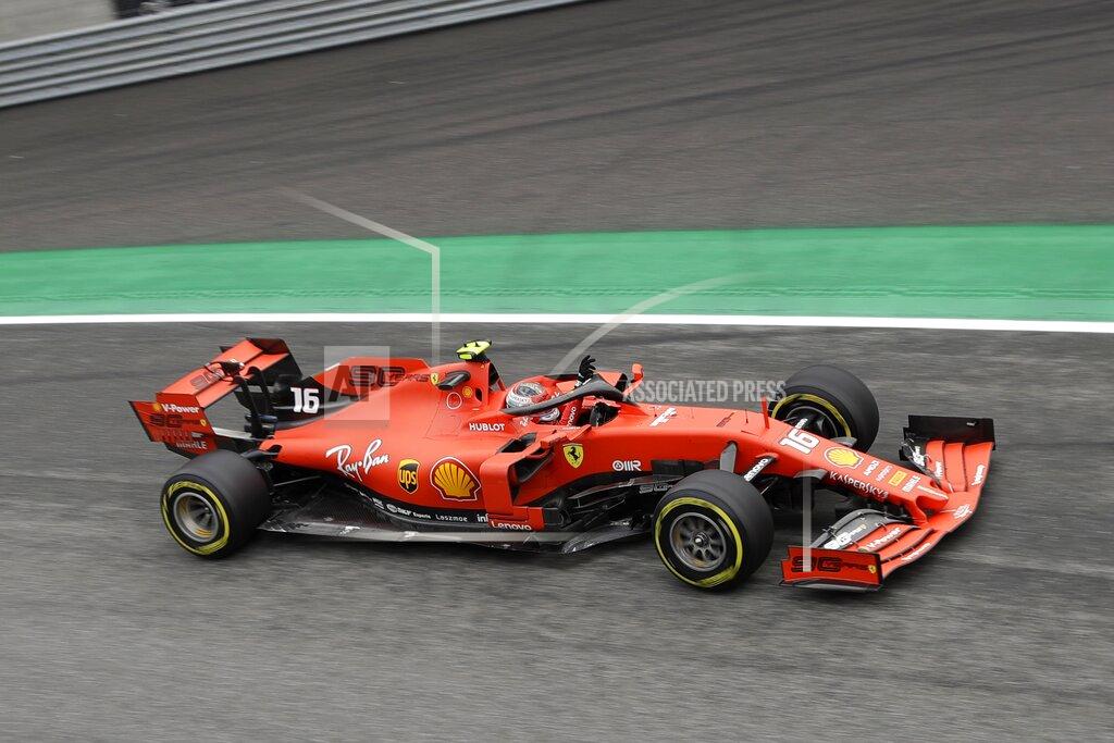 Luca Bruno Ferrari driver Charles Leclerc of Monaco waves to supporters as he steers his car during the first free practice at the Monza racetrack, in Monza, Italy, Friday, Sept. 6, 2019. The Formula one race will be held on Sunday. (AP Photo/Luca Bruno)