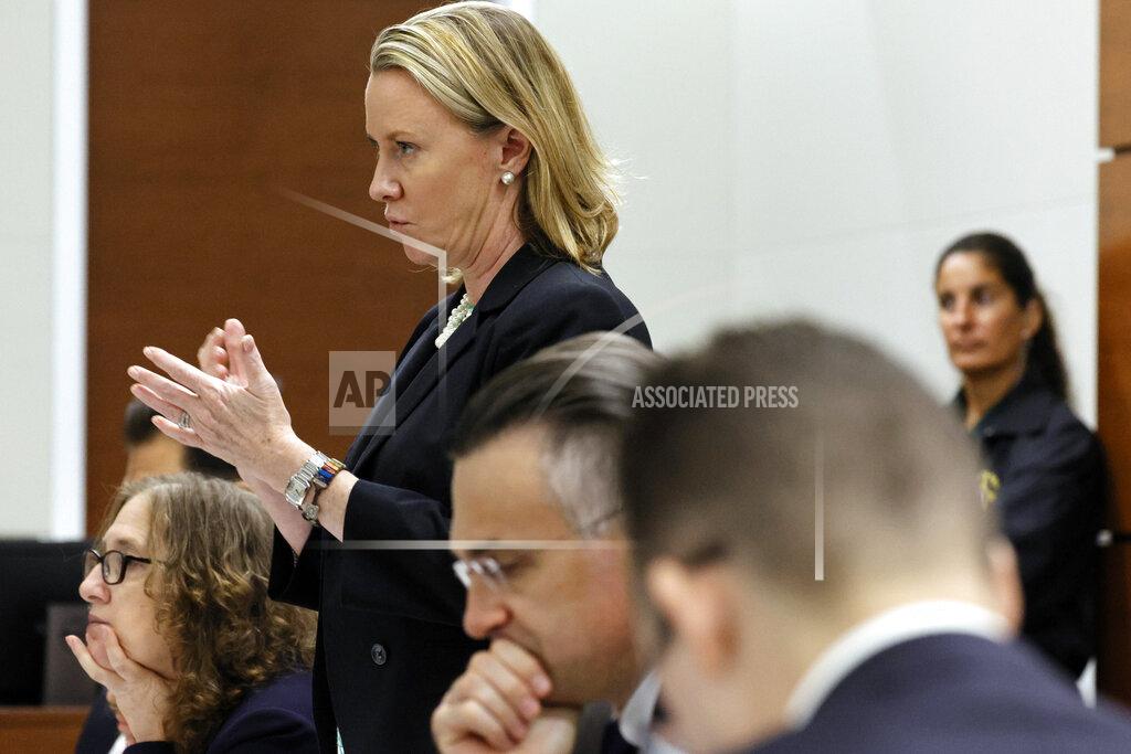 Amy Beth Bennett Assistant Public Defender Melisa McNeill questions a prospective juror who entered the courtroom during jury selection in the penalty phase of the trial of Marjory Stoneman Douglas High School shooter Nikolas Cruz at the Broward County Courthouse in Fort Lauderdale on Monday, May 23, 2022. Cruz previously plead guilty to all 17 counts of premeditated murder and 17 counts of attempted murder in the 2018 shootings. (Amy Beth Bennett/South Florida Sun Sentinel via AP, Pool)